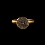 A ROMAN GOLD FINGER RING WITH INSCRIPTION, CIRCA 1ST-2ND CENTURY A.D.