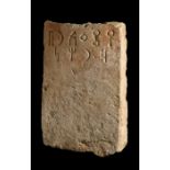 A PHOENICIAN INSCRIBED STONE TABLET, PROBABLY 7TH CENTURY B.C.