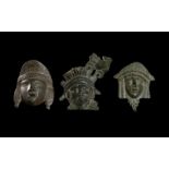 THREE BRONZE ROMAN MASKS, CIRCA 1ST CENTURY A.D.