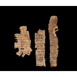 THREE PAPYRUS FRAGMENTS, IN COPTIC and ARABIC, CIRCA 7TH CENTURY
