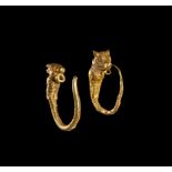 A PAIR OF GREEK GOLD BULL HEAD EARRINGS HELLENISTIC PERIOD, CIRCA 3RD CENTURY B.C.