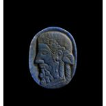 A LAPIS LAZULI CAMEO OF RULER, PROBABLY ANCIENT