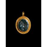 A GOLD PENDANT DEPICTING ALEXANDER THE GREAT, PROBABLY ROMAN
