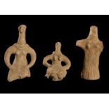 THREE ANATOLIAN TERRACOTTA IDOLS CIRCA LATE 3RD MILLENNIUM B.C.