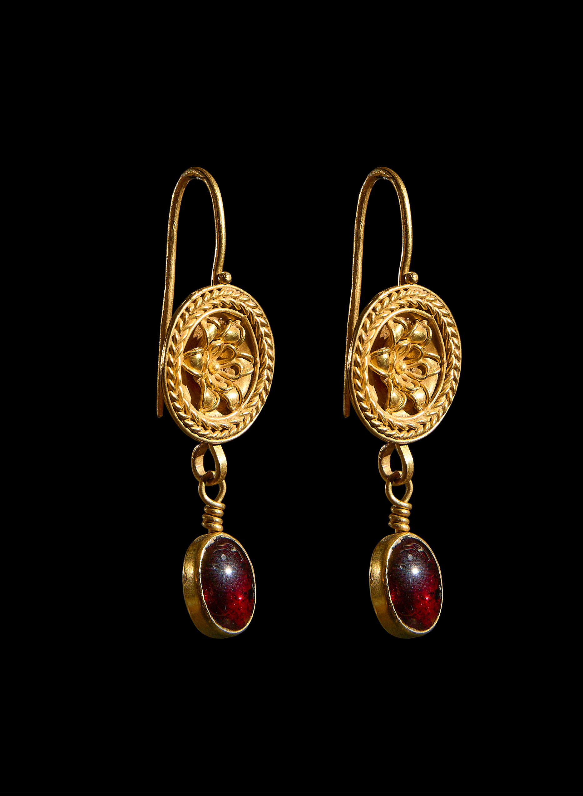 A PAIR OF ROMAN GOLD MEDALLION AND GARNET EARRINGS CIRCA 2ND-3RD CENTURY A.D.