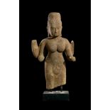 AN IMPORTANT SANDSTONE FIGURE OF VISHNU, KHMER, BAKONG STYLE CIRCA 11TH CENTURY