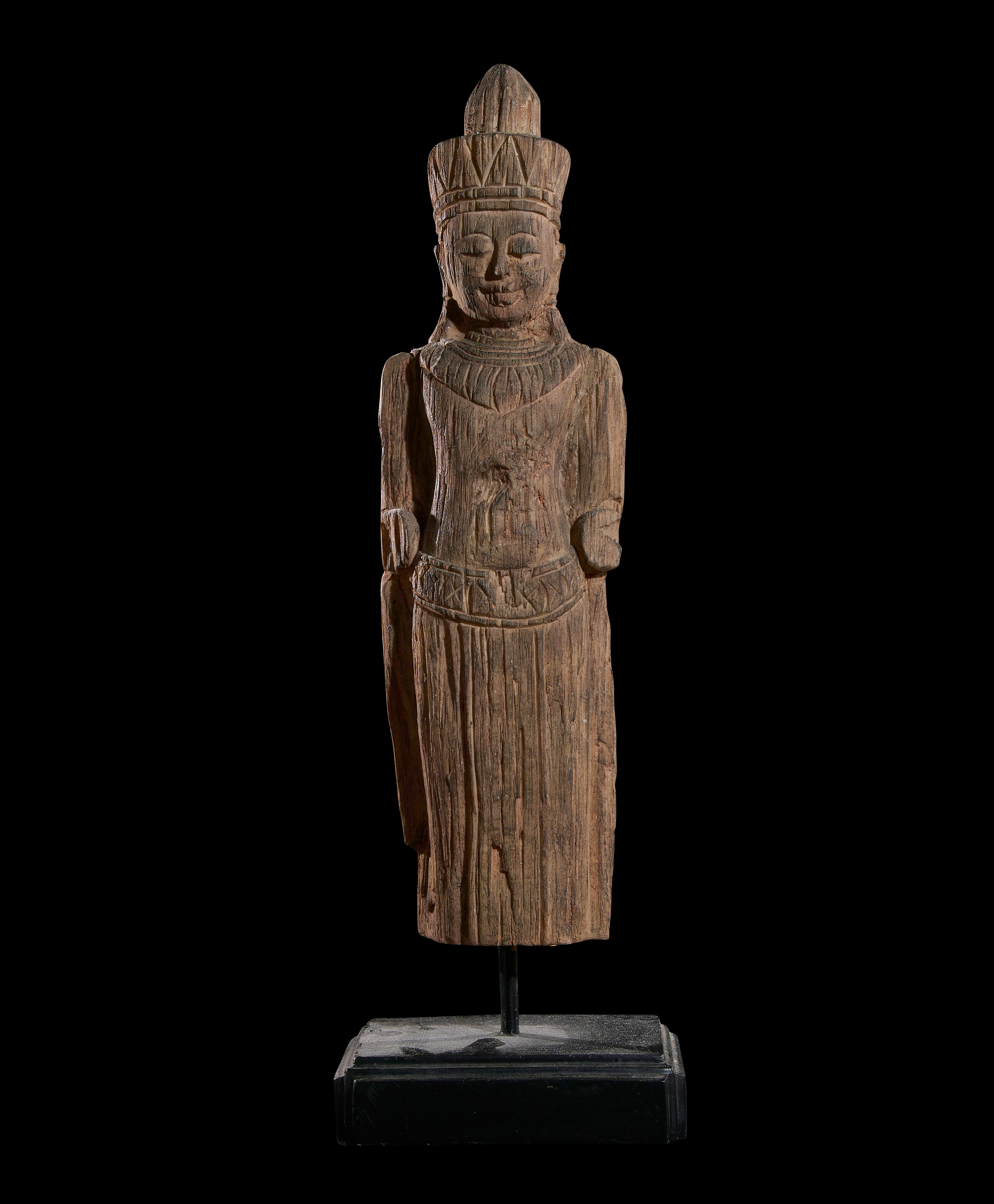 A CARVED KHMER WOODEN FIGURE, PROBABLY 13TH CENTURY