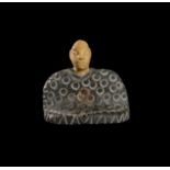 A BACTRIAN CHLORITE SEATED IDOL