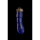 A DARK BLUE GLASS PHALLUS PENDANT SET ON SILVER, PROBABLY GREEK