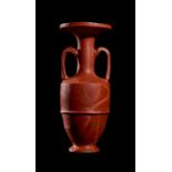 A ROMAN RED TERRACOTTA AMPHORA TWIN HANDLED VASE, CIRCA 1ST CENTURY A.D.