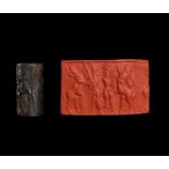 A LARGE HEMATITE SUMERIAN CYLINDER SEAL, CIRCA 2500-2300 B.C.