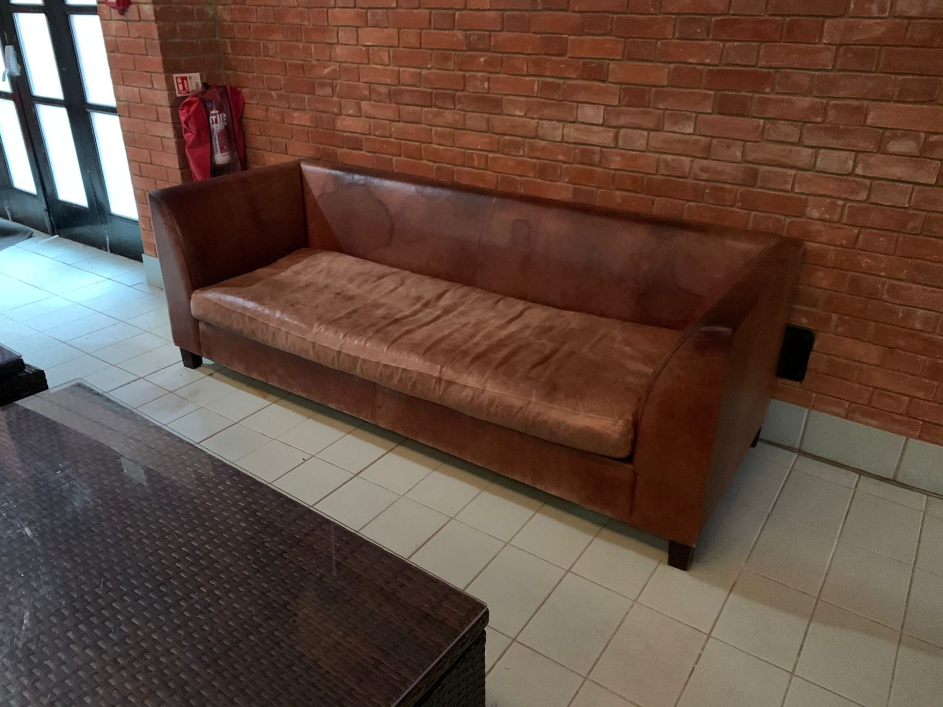 Leather upholstered sofa 230 x 87 x 82cm (Nb Water marked) ( Leisure Centre )