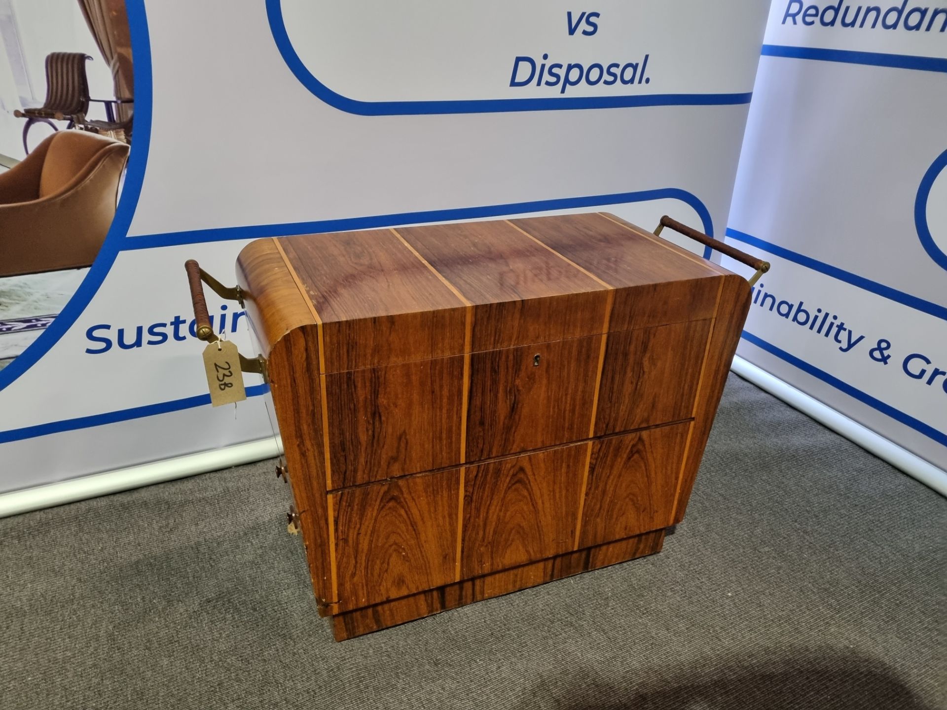 A flamed mahogany trolley with 4 small side drawers, 2 front drawers, lift up top brass and - Image 3 of 6