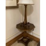 A mahogany hall lamp mounted on an hexagonal table with box strung top above a baluster pedestal
