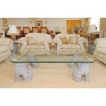 Glass top coffee table supported by a quadrant of guardian lion foo Dog pedestals with brass