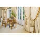 Silk cream drapes with pelmet and swags spans an area of 5m french door and windows