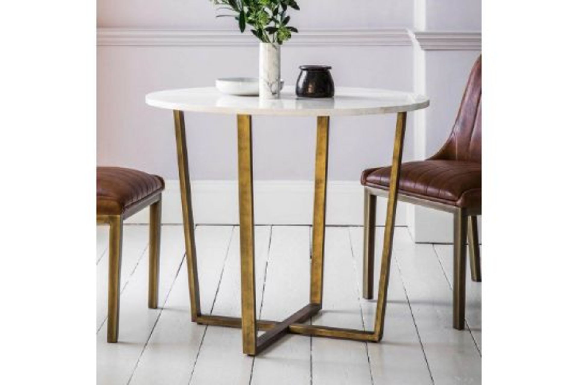 Cleo Dining Table A Contemporary Round Dining Table Featuring Spanish Volkas Marble In White With