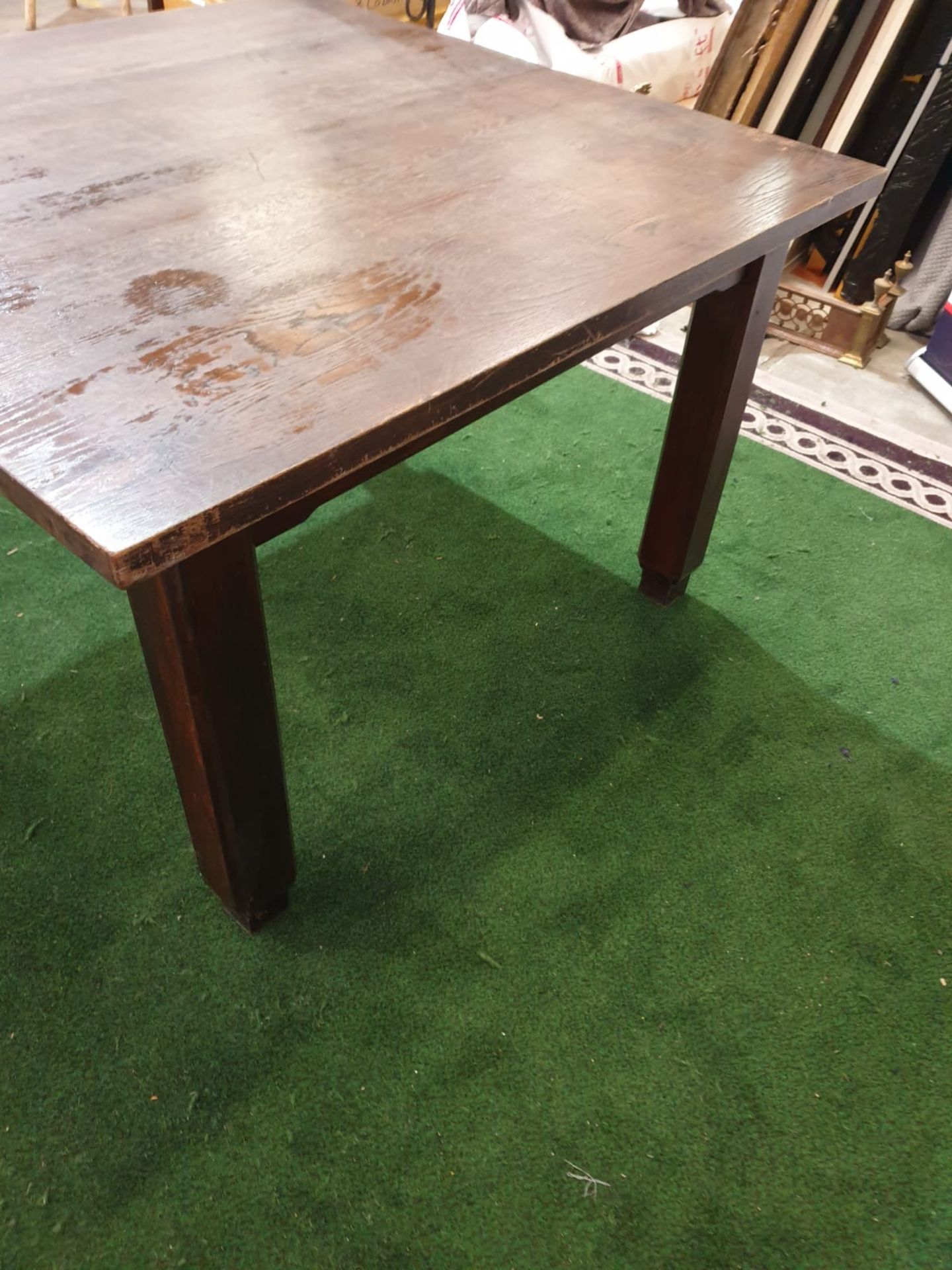 An English stained oak dining table. The square top on square chamfered legs with tapered feet. c. - Image 4 of 4