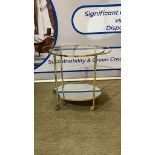 Mirrored oval bar cart Roll this oval bar cart into your dining room, home bar, or other area for