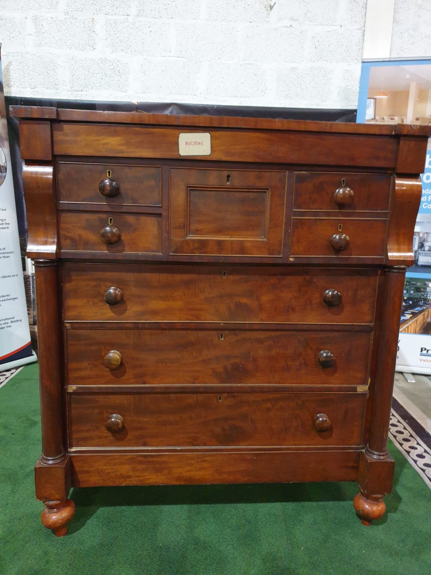 A Victorian mahogany chest. The oblong top above a flush frieze and a panelled hat drawer flanked by - Image 5 of 6