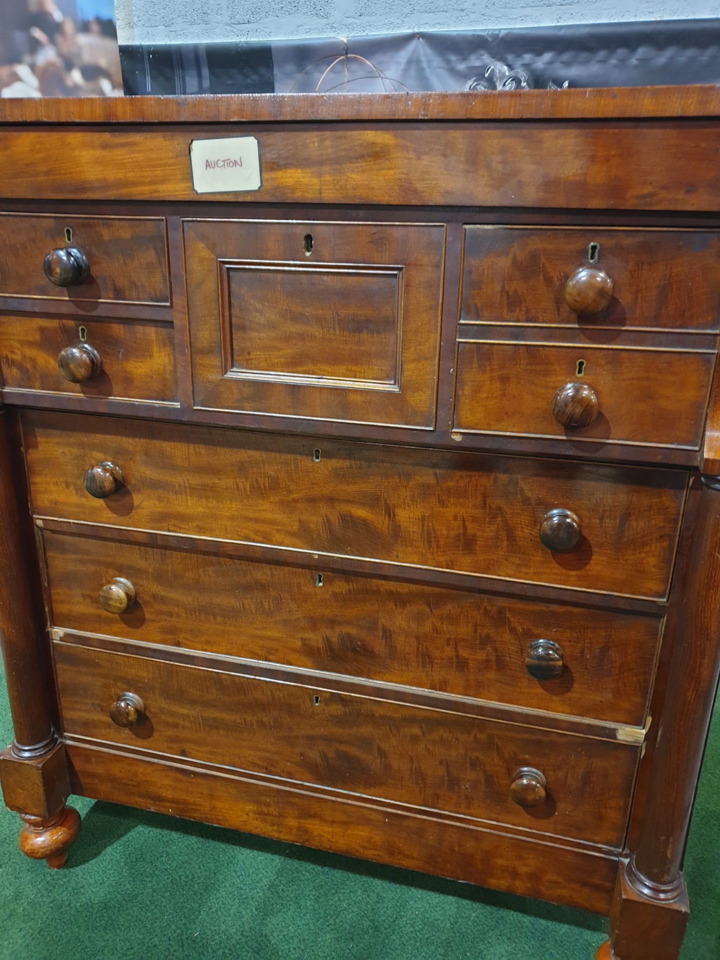 A Victorian mahogany chest. The oblong top above a flush frieze and a panelled hat drawer flanked by - Image 2 of 6