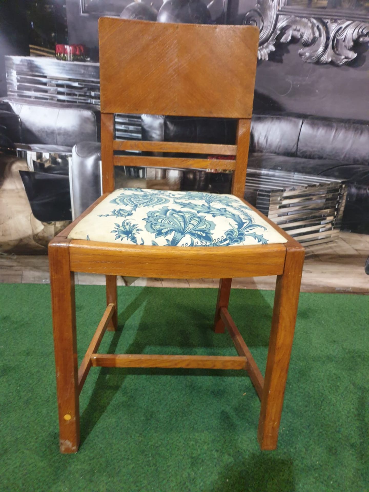 An English oak Art Deco single chair. The mirror veneered back above a drop in fabric covered