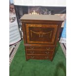 A Georgian style reproduction TV cabinet with three drawers under in mahogany veneers with a classic