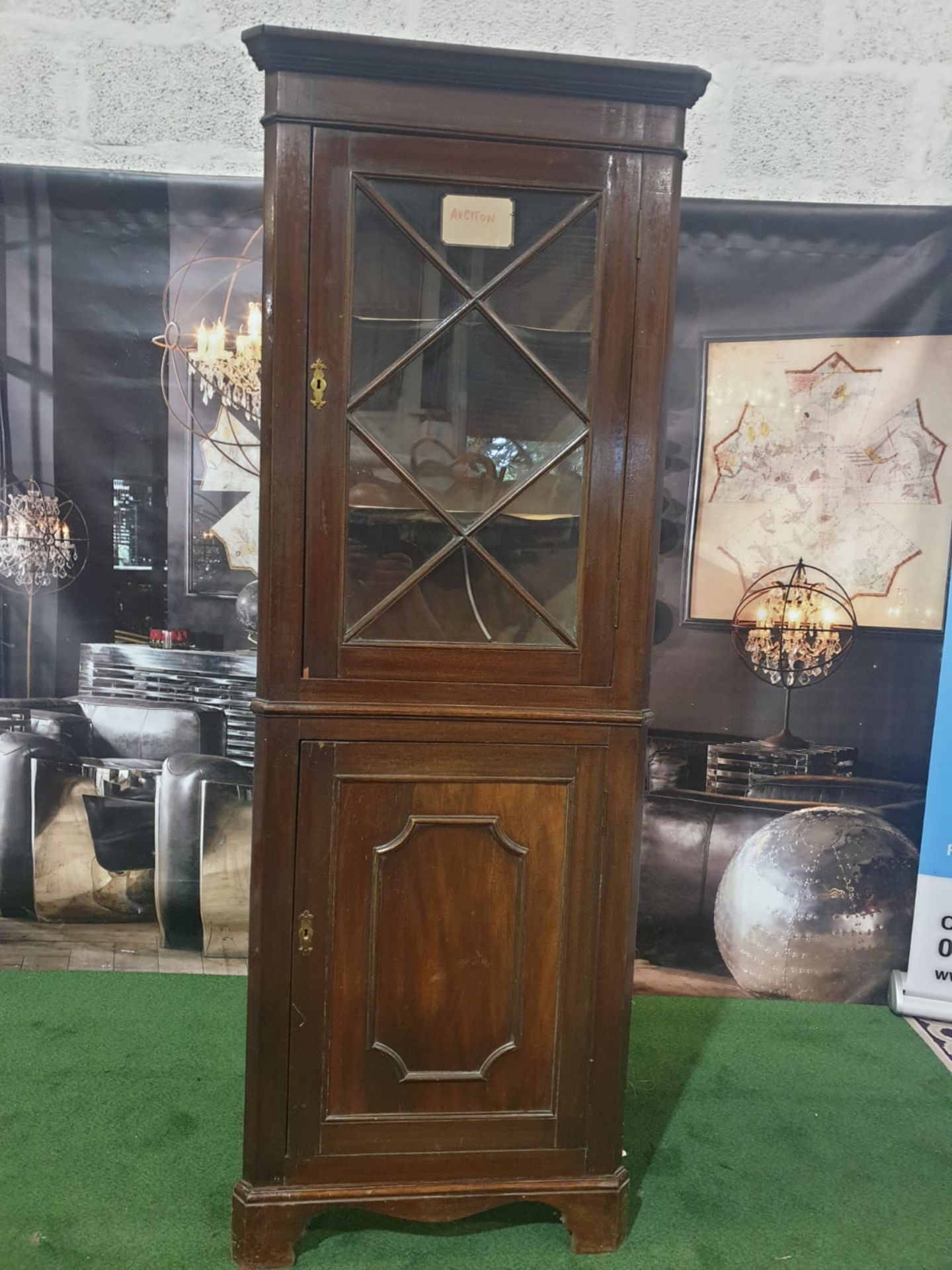 A mahogany standing corner cupboard in George III style. The moulded cornice above a single glazed - Image 4 of 5