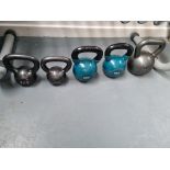 Set of Cast-iron kettlebells at 2 x 8kg 2 x 16kg and 1 x 24 kg
