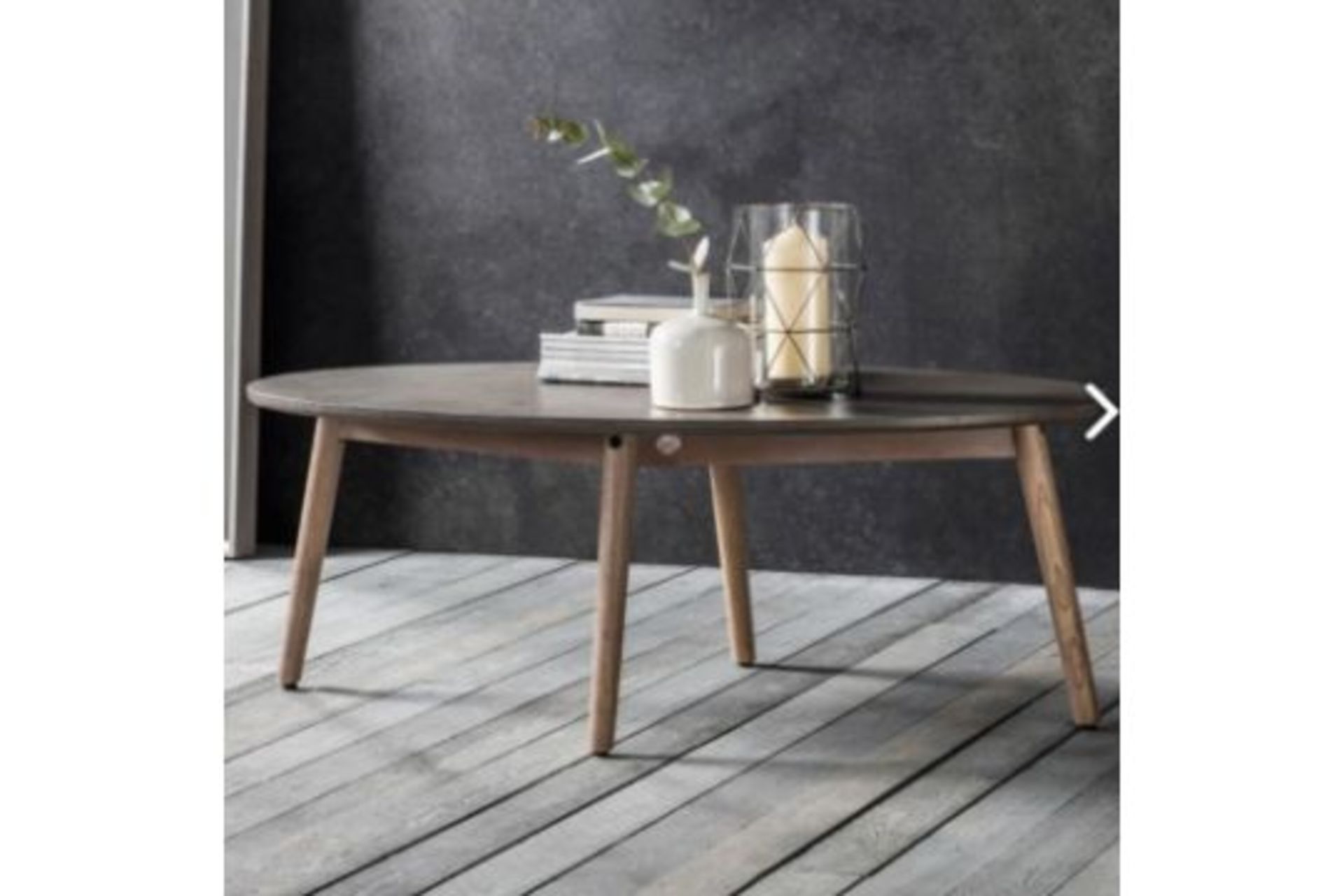 Bergen Oval Coffee Table The Bergen Oval Coffee Table Is A Striking Coffee Table Crafted Using Solid