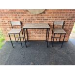 A tall wood and metal bar table with 2 x counter stools
