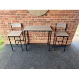 A tall wood and metal bar table with 2 x counter stools