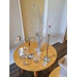 various candle holders and candelabras