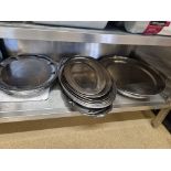 Various stainless steel platters as found