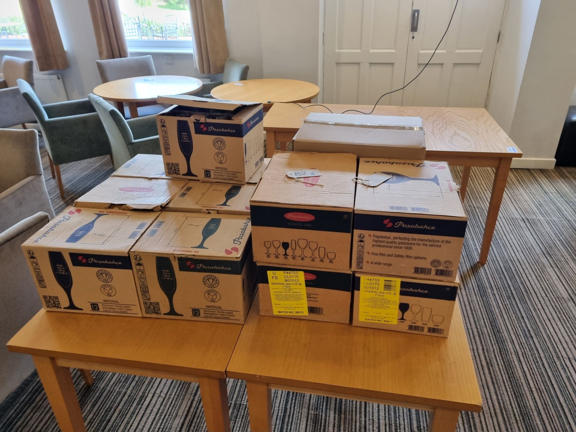 various boxes of champagne and wine glasses