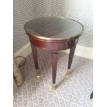 Circular Side Table With Antiqued Plate Top And Brass Trim Mounted On Tapering Legs With Brass