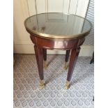 Circular Side Table With Antiqued Plate Top And Brass Trim Mounted On Tapering Legs With Brass