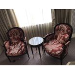 A Pair Of Bergere Chairs Black Wood Frame Upholstered In A Rust Red And Cream Damask Pattern With