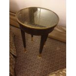 Circular Side Table With Antiqued Plate Top And Brass Trim Mounted On Tapering Legs With Brass