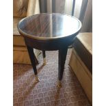 Circular Side Table With Antiqued Plate Top And Brass Trim Mounted On Tapering Legs With Brass