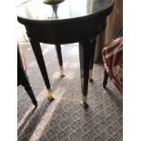 Circular Side Table With Antiqued Plate Top And Brass Trim Mounted On Tapering Legs With Brass