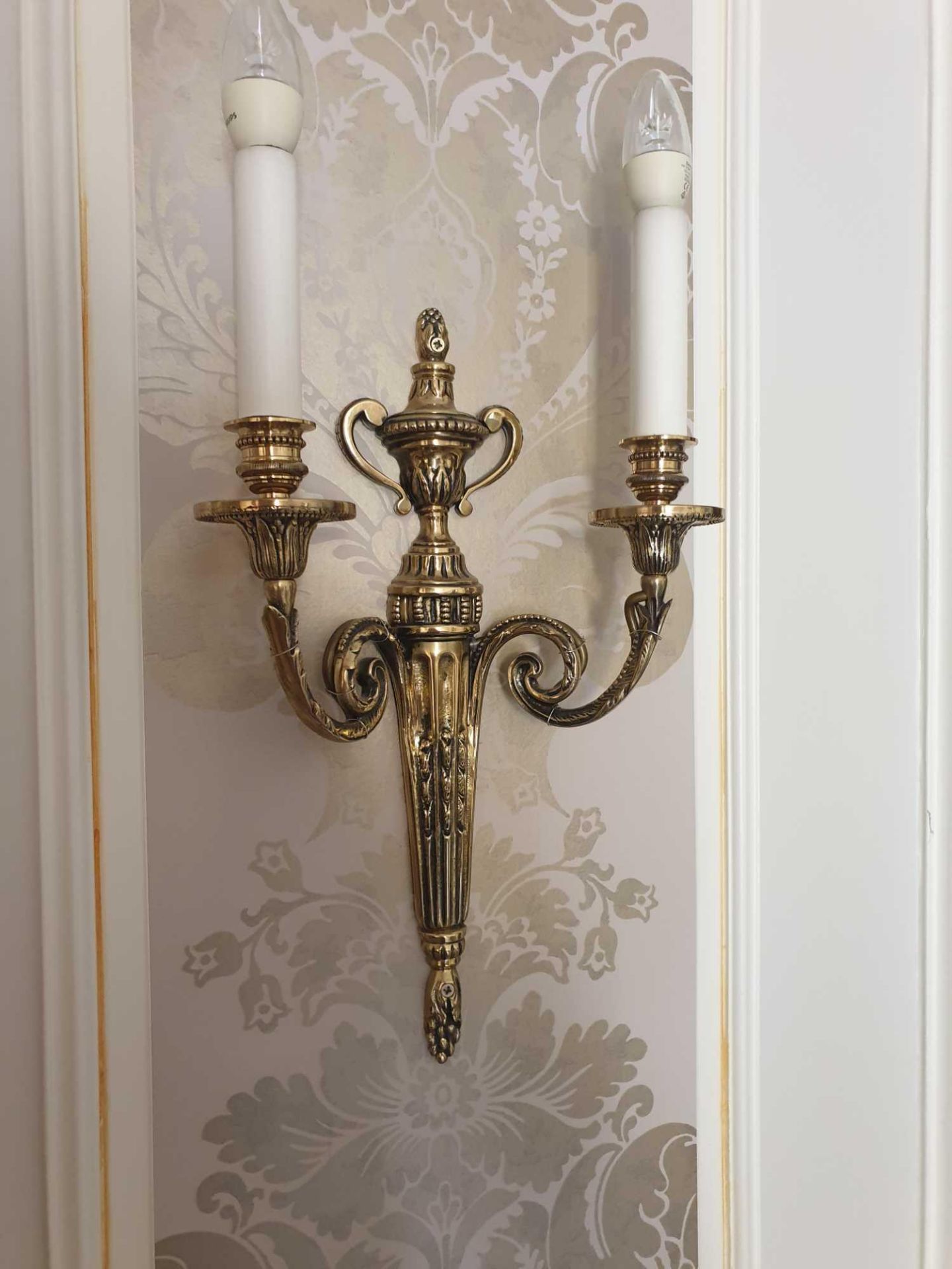 A Pair Of Wall Appliques Twin Leaf Capped Scroll Arms Issuing From A Well-Cast Single Decorative