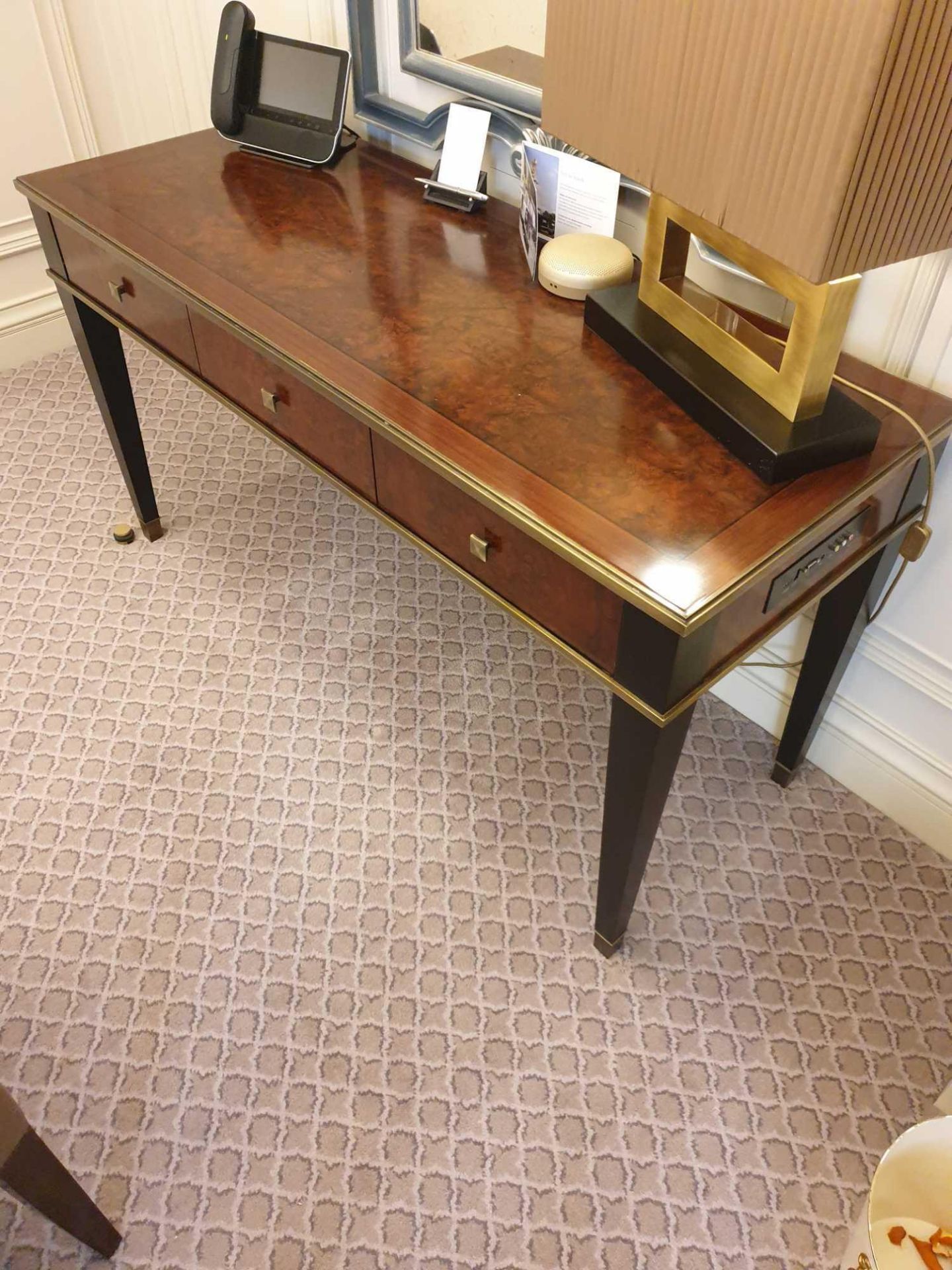 A Kingswood And Rosewood Writing Desk With Brass Trim And Marquetry Inlay Mounted On Four Tapering