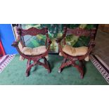 A pair of Savonarola chairs Italian renaissance styled Savonarola chairs in amazingly carved