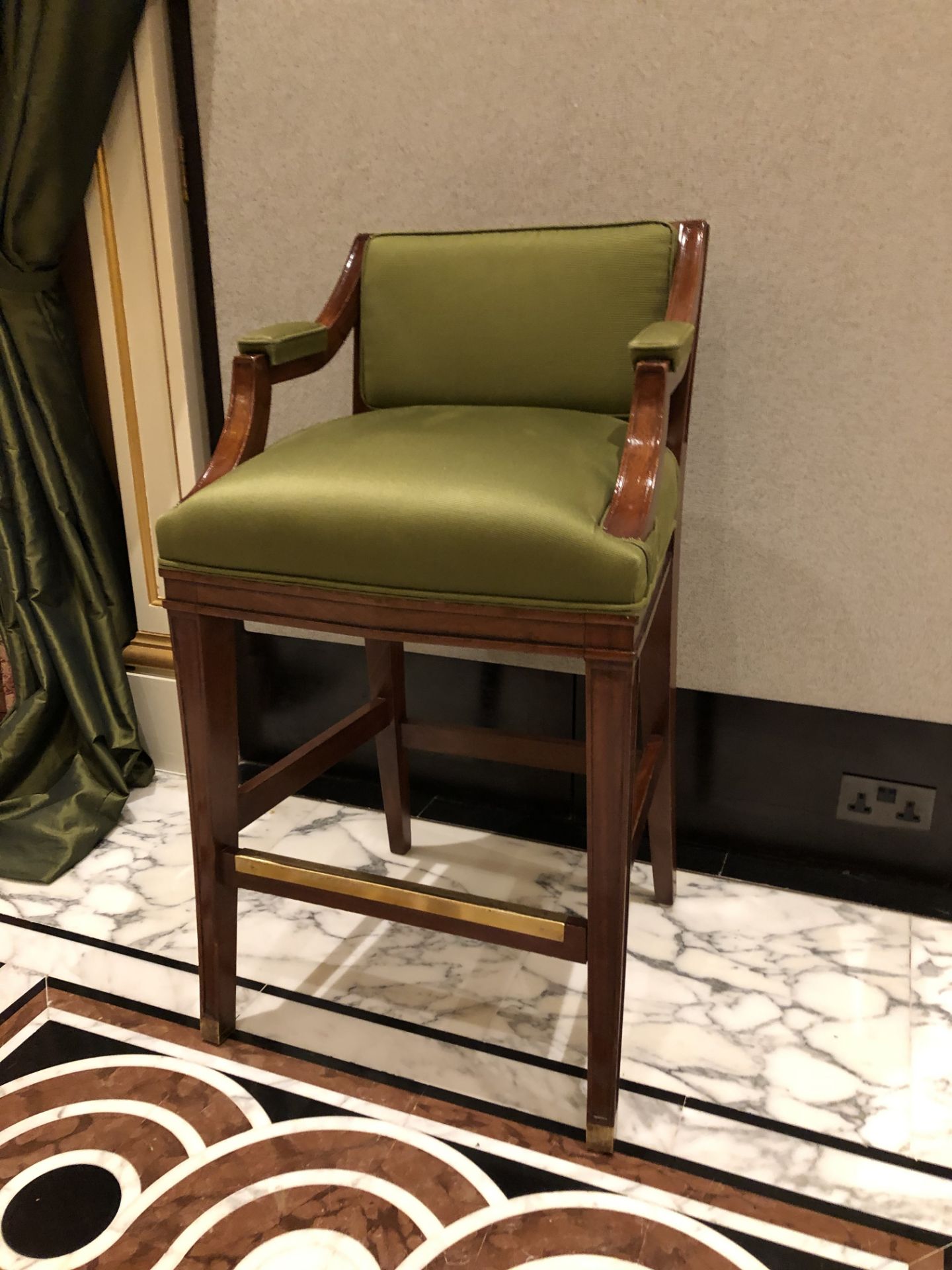 Neoclassic style mahogany tall bar stool, with a Lelievre Paris Olive Green upholstered padded