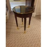 Circular Side Table With Antiqued Plate Top And Brass Trim Mounted On Tapering Legs With Brass