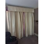 A Pair Of Cream Silk Drapes With Pelmet With Purple Trim Detail On Curtains And Purple Detail In