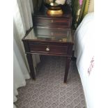 A Pair Of Two Tier Bedside Nightstands With Antiqued Plate Top With Storage Compartments Mounted