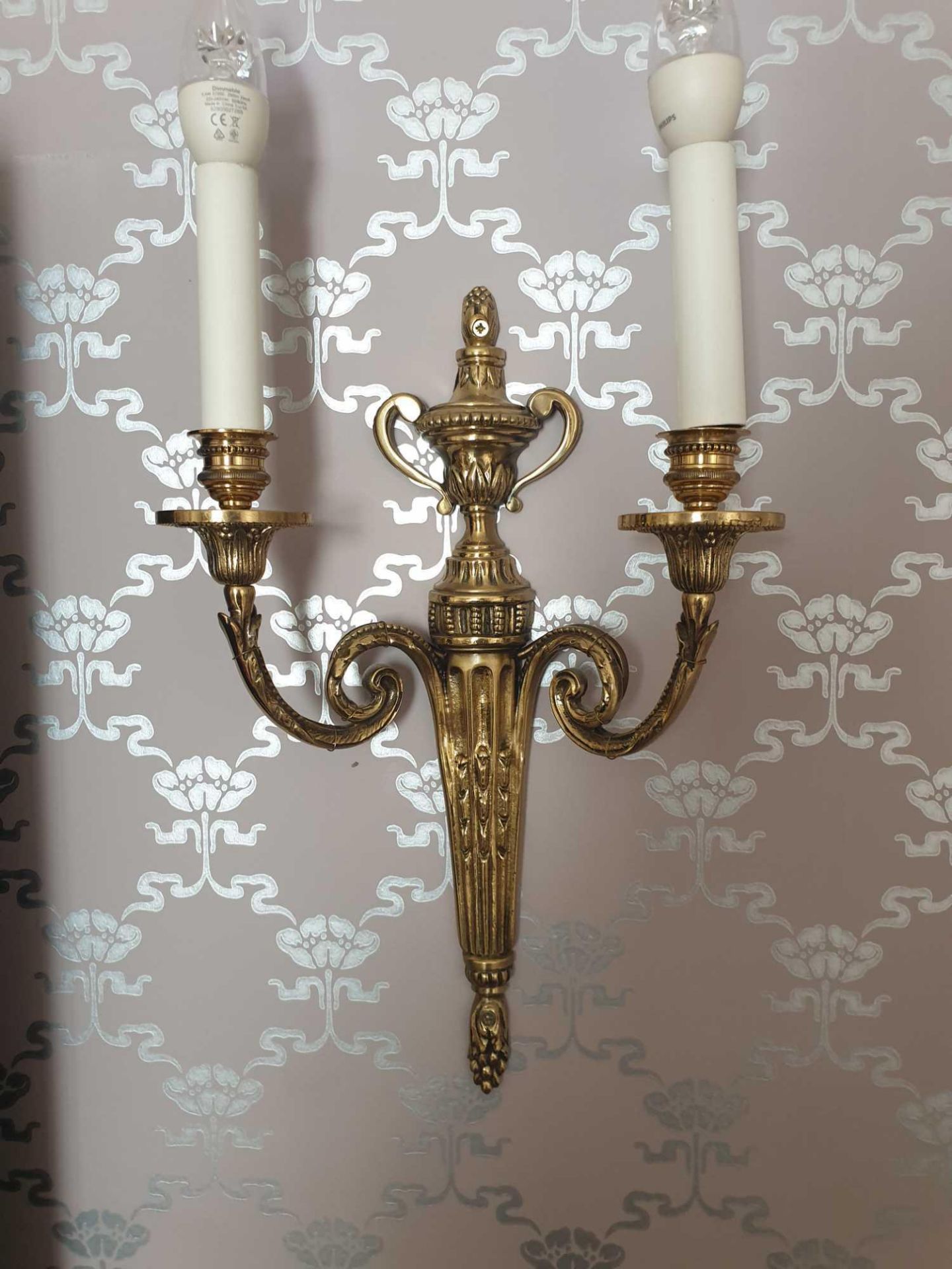 A Pair Of Wall Appliques Twin Leaf Capped Scroll Arms Issuing From A Well-Cast Single Decorative