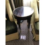 Circular Side Table With Antiqued Plate Top And Brass Trim Mounted On Tapering Legs With Brass